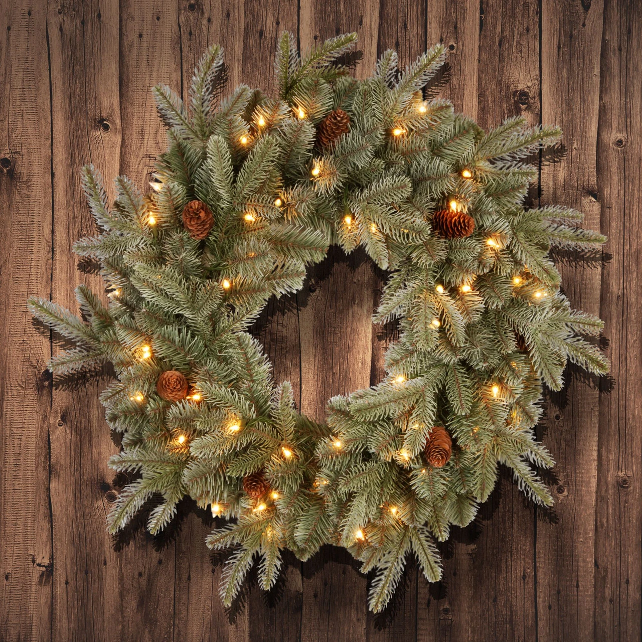 Pre-Lit Frosted Arctic Spruce Artificial Christmas Wreath - 24-Inch, Clear Lights 5 Pre-Lit Frosted Arctic Spruce Artificial Christmas Wreath - 24-Inch, Clear Lights - Image 3