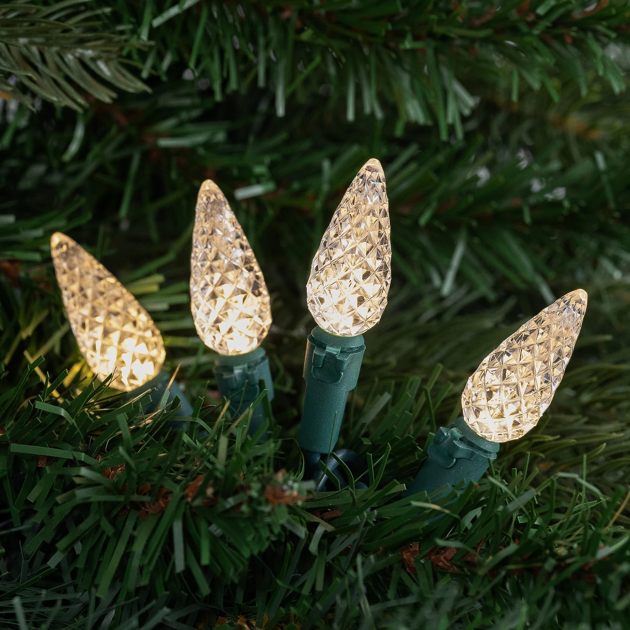 70 Warm White LED Faceted C6 Christmas Lights - 23 Ft Green Wire 5 70 Warm White LED Faceted C6 Christmas Lights - 23 Ft Green Wire - Image 3