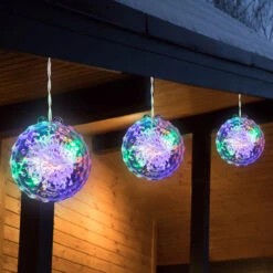 6" LED Lighted Multi-Color Hanging Crystal Sphere Outdoor Christmas Decoration 8 6" LED Lighted Multi-Color Hanging Crystal Sphere Outdoor Christmas Decoration -Christmas Decoration Store northlight ys27567 3 94315.1667578355
