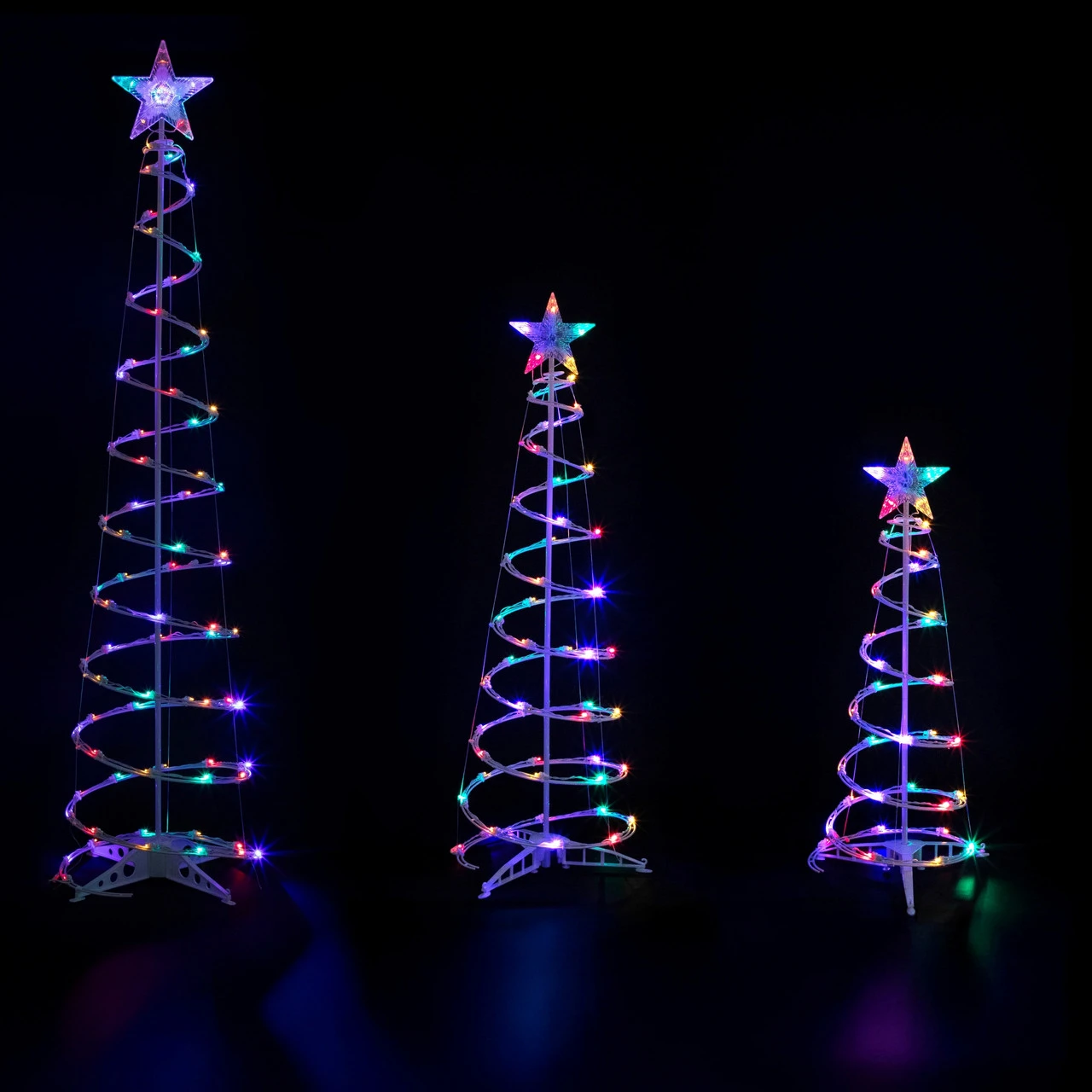 Set Of 3 LED Lighted Multi-Color Outdoor Spiral Christmas Cone Trees 3', 4', And 6' 3 Set Of 3 LED Lighted Multi-Color Outdoor Spiral Christmas Cone Trees 3', 4', And 6'