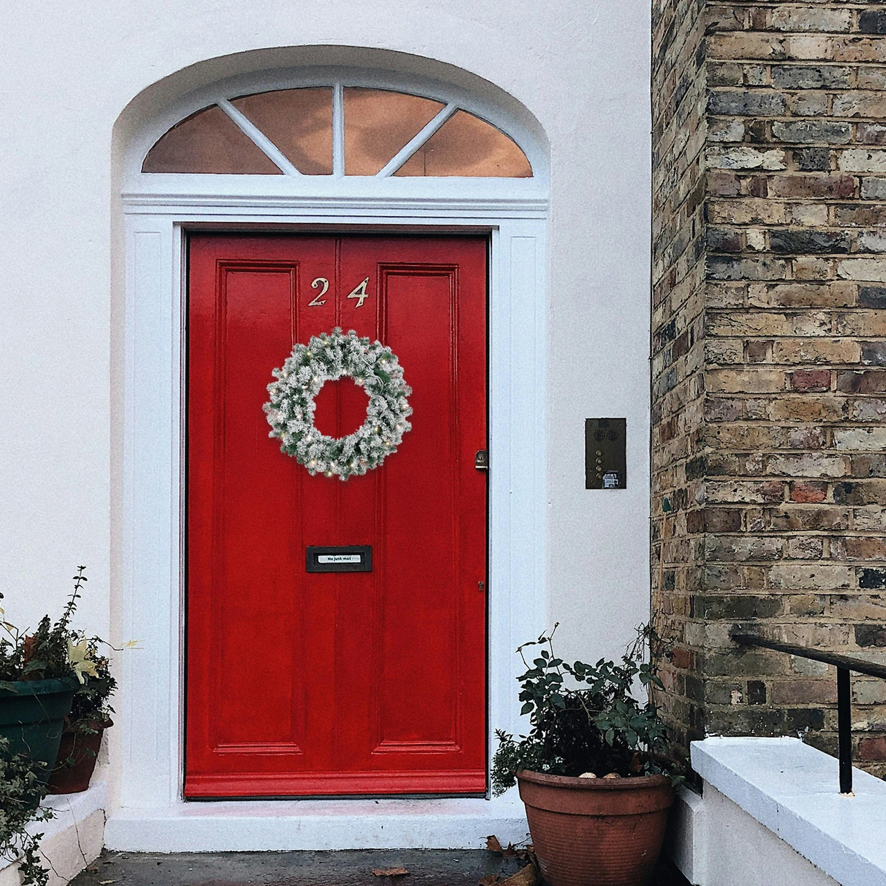 Pre-Lit Flocked Snow White Artificial Christmas Wreath, 24-Inch, Clear Lights 4 Pre-Lit Flocked Snow White Artificial Christmas Wreath, 24-Inch, Clear Lights - Image 2